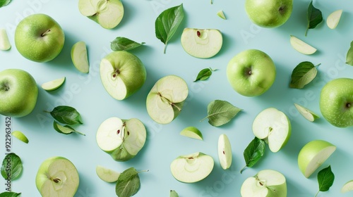 Juicy green apples with leaves on blue background, perfect for vibrant summer ad design