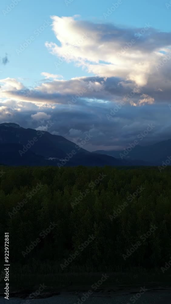 Forest And Mountains by River. Fraser Valley, British Columbia, Canada. Forest And Mountains by River. Fraser Valley, British Columbia, Canada.