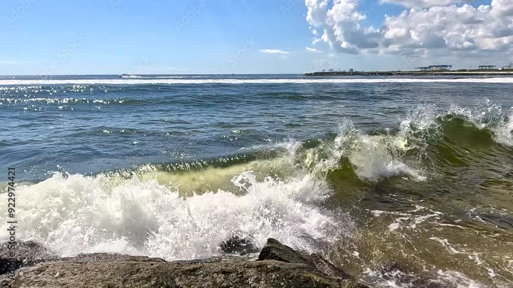 Slow motion waves crashing onto Fort Lauderdale jetty rocks Slow motion waves crashing onto Fort Lauderdale jetty rocks