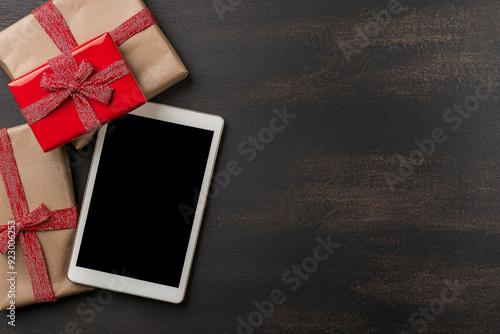 Holiday Shopping on Tablet with Festive Decor photo