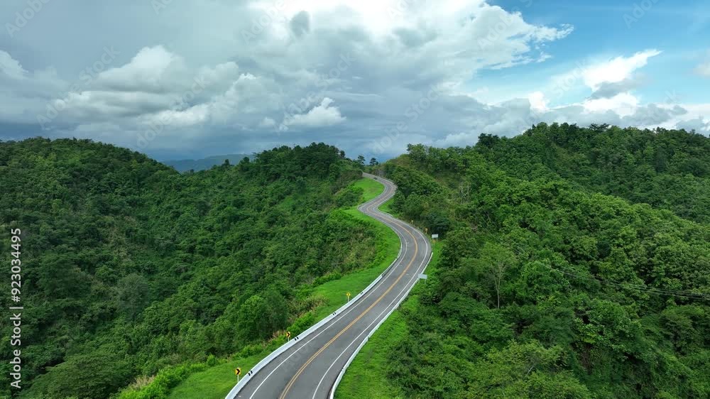 Aerial View of Road No 3 from a Drone - Nan Province Thailand
Aerial View of Road No 3 from a Drone - Nan Province Thailand