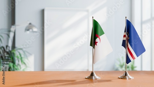 FLAGS OF ALGERIA AND CAPE VERDE ON TABLE photo