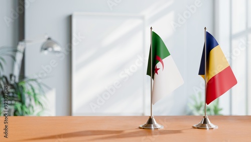 FLAGS OF ALGERIA AND ROMANIA ON TABLE photo