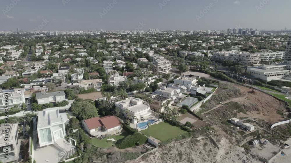 One of the most expensive neighborhoods that is close to the beach in Herzliya Pituach, Israel - the neighborhood attracts very rich families, investors, non-residents, housing developers - D-log file One of the most expensive neighborhoods that is close to the beach in Herzliya Pituach, Israel - the neighborhood attracts very rich families, investors, non-residents, housing developers - D-log file