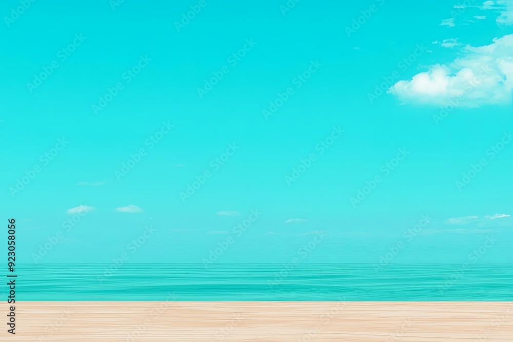 Fototapeta premium A serene beach scene featuring a clear blue sky and tranquil ocean waves under a bright sun. Perfect for relaxation themes.