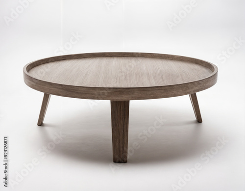 Grey round coffee table on a white background. Isolated