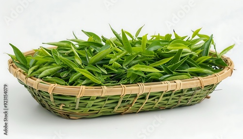 Green tea leaves in a wicker basket