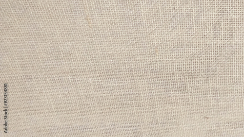 Burlap woven texture seamless. jute background close up macro. Jute hessian sackcloth canvas woven texture pattern background in light beige cream brown color blank empty