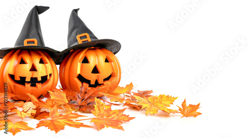 Two playful pumpkins adorned with witch hats rest among vibrant autumn leaves, inviting a whimsical Halloween spirit