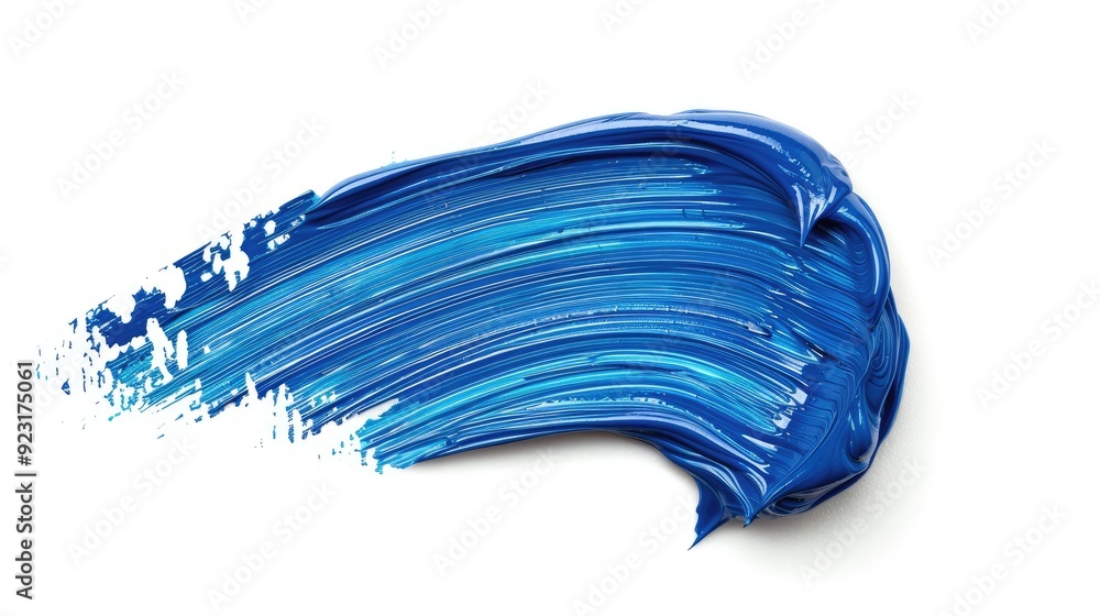 Sweeping Indigo Blue Brush Stroke with Splashes on White Background Sweeping Indigo Blue Brush Stroke with Splashes on White Background
