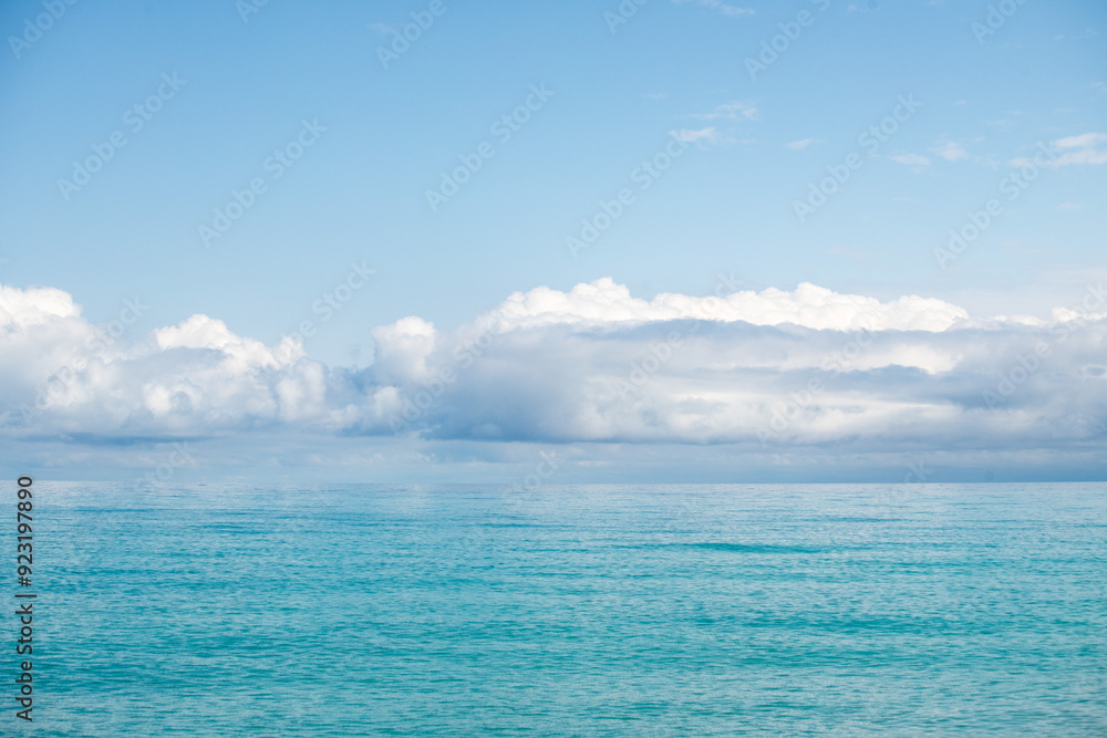 Blue sea and blue sky with white clouds. Seascape. Blue sea and blue sky with white clouds. Seascape.