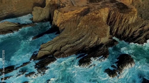 4K Aerial Video of Ocean Waves Crashing on Rocks