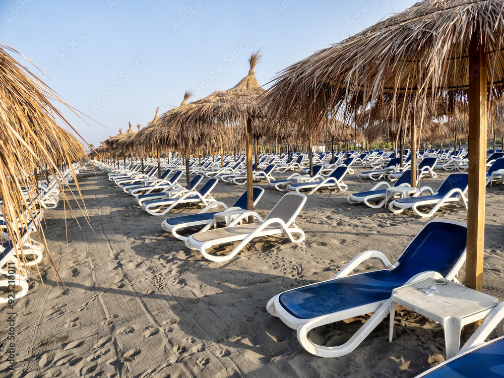 In the morning, there are empty sunbeds on the beach of Černá Hora.