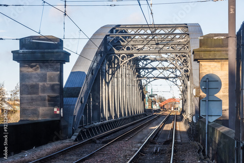 Monkwearmouth Railway Bridge - Designed by Thomas Harrison and constructed in 1879, this is a wrought iron, single-span bridge over the river Wear. Now also used by the Tyne and Wear Metro service.