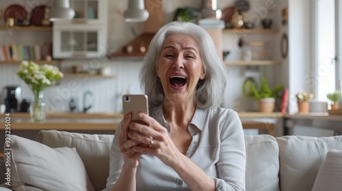 The elderly woman laughing photo