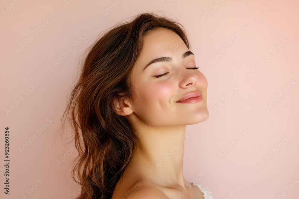 A close up of a woman's face with her eyes closed A close up of a woman's face with her eyes closed