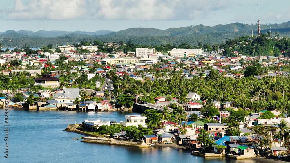 Buildings and residential villlage in Surigao City. Mindanao, Philippines. Zoom view. Buildings and residential villlage in Surigao City. Mindanao, Philippines. Zoom view.