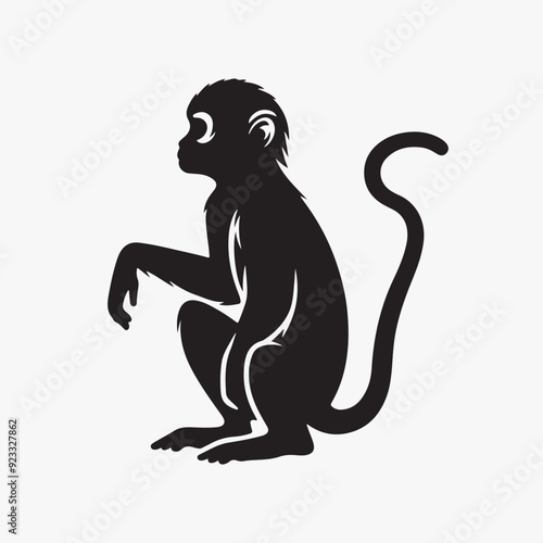 A simple yet evocative silhouette of a monkey, capturing its playful nature and inquisitive gaze. Perfect for adding a touch of whimsy to your designs.