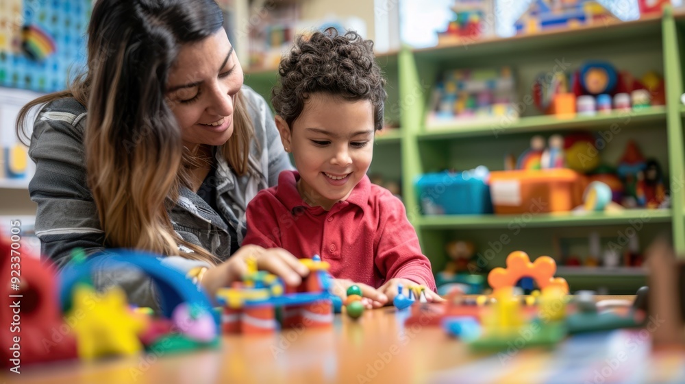 The teacher and child playing The teacher and child playing