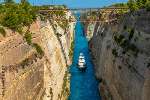 Greece Peloponnese Corinth Canal and a boat passing through the canal