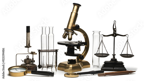 Collection of Antique Science Tools: Brass Microscope, Test Tubes, Burner, Magnifying Glass, Scales on Isolated Surface