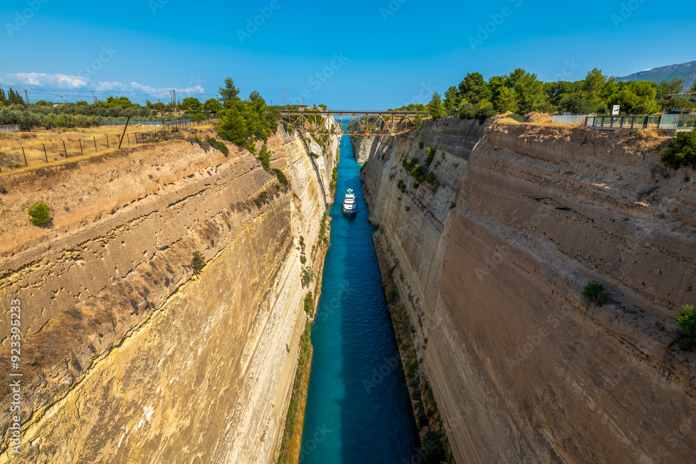 Obraz premium Greece Peloponnese Corinth Canal and a boat passing through the canal