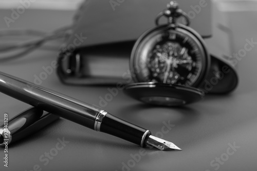 Wallpaper Mural Fountain pen, beautiful fountain pen and beautiful vintage watch positioned on leather surface, selective focus. Torontodigital.ca