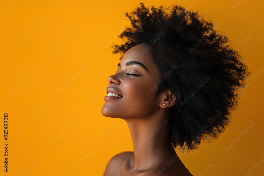 A close up of a black woman's face with her eyes closed A close up of a black woman's face with her eyes closed