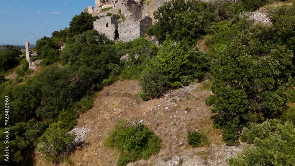 Aerial establishing shot of the ruins of Château Bas d'Aumelas Aerial establishing shot of the ruins of Château Bas d'Aumelas