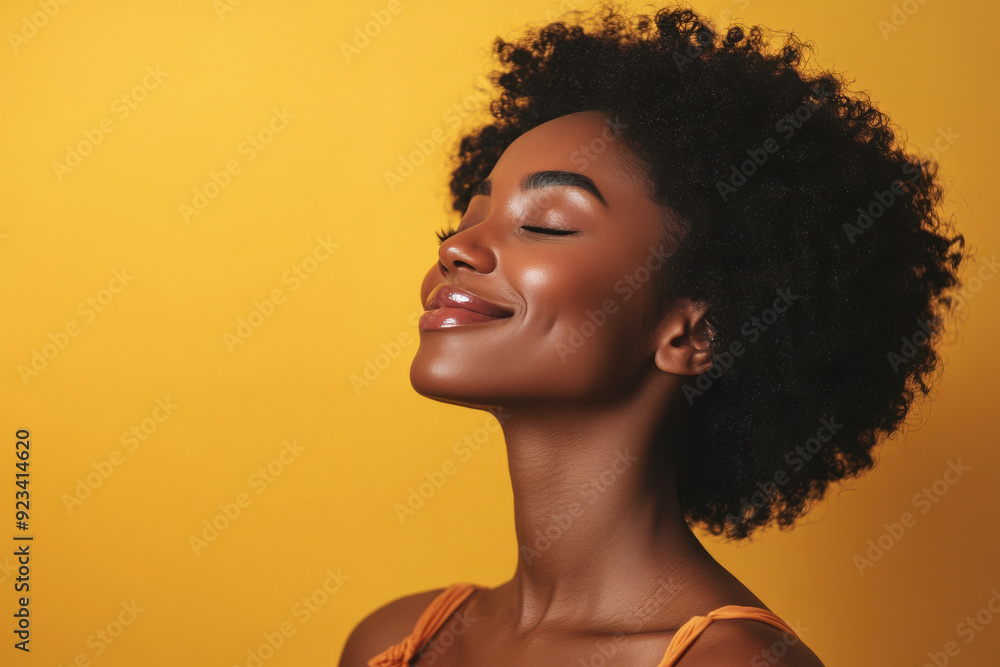 A close up of a black woman's face with her eyes closed A close up of a black woman's face with her eyes closed