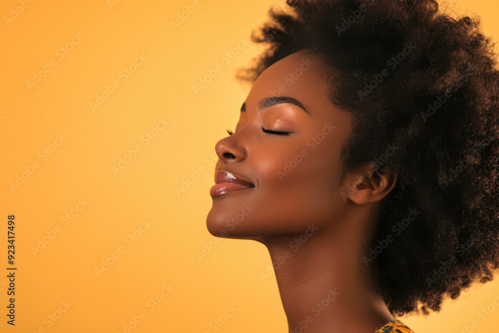 A close up of a black woman's face with her eyes closed