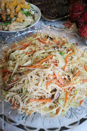 Rice vermicelli with mushrooms on a plate, a dish for Chinese New Year