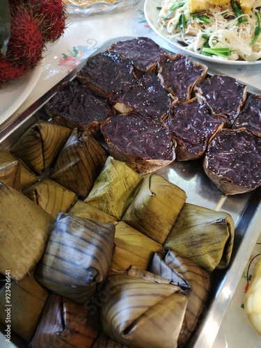 Steamed rice cakes and coconut-filled steamed rice cakes on a plate, a dish for Chinese New Year