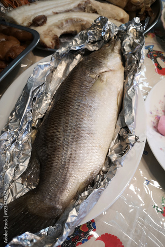 Steamed sea bass on a plate, a dish for Chinese New Year