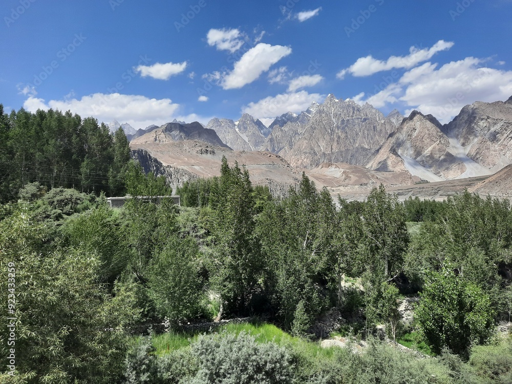 Beautiful view of the Passu Cones. The Passu Cones are a mountain range in Gilgit Baltistan, Pakistan. They are called Passu Cones because of their conical shape. Beautiful view of the Passu Cones. The Passu Cones are a mountain range in Gilgit Baltistan, Pakistan. They are called Passu Cones because of their conical shape.