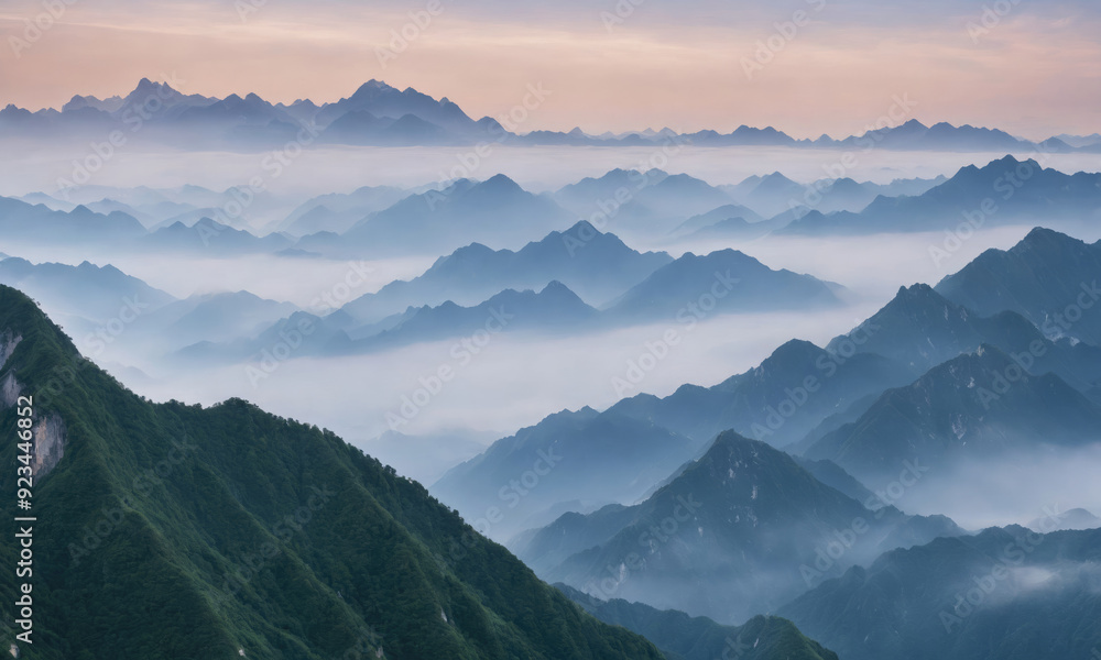 Majestic Mountain Range Illuminated by Soft Sunrise Glow Over Misty Valley Majestic Mountain Range Illuminated by Soft Sunrise Glow Over Misty Valley