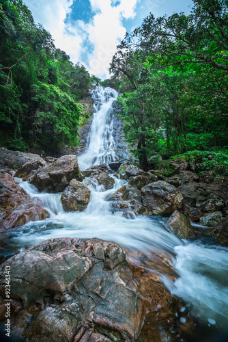 Beautiful natural Sarika waterfall with rocks in the foreground at Khao Yai National Park, Nakhon Nayok, Thailand
