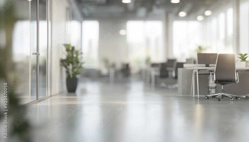 Modern office interior with desks and plants in a spacious, bright environment Modern office interior with desks and plants in a spacious, bright environment