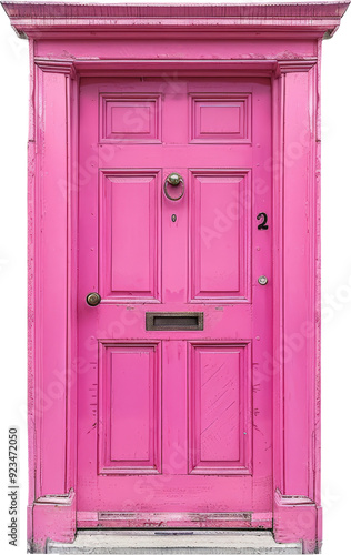 A bright pink door with a brass knocker and a number 2 on the door frame.