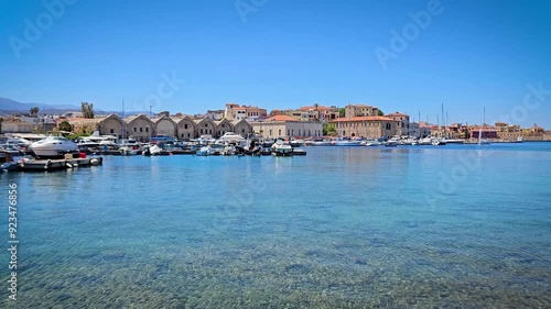 Wallpaper Mural Landscape of Chania, Crete with Old Port and Old Town with Venetian shipyards, boats and White Mountains in the background.  Torontodigital.ca