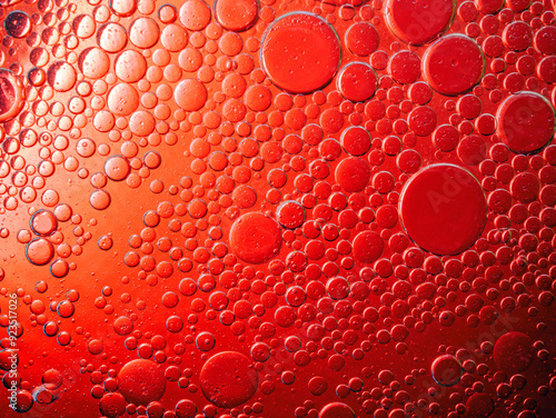 Abstract Background Red oil Macro Colorful artistic of oil drop floating on the water. macro red bubble oil of wallpeper, blood concept photo