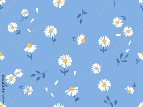 Seamless pattern of daisy chamomile flower with leaves and flying petals on blue background vector. Cute floral print.