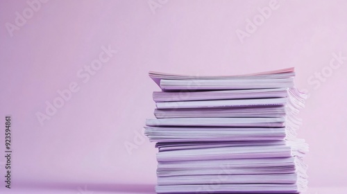Stack of Newspapers on Light Violet Background with Journalistic Concept