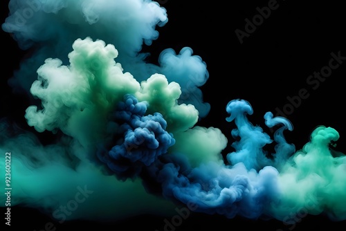 Abstract blue and green smoke clouds on a black background.