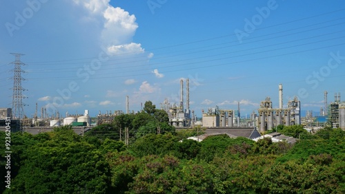 Large industrial plants coexist with nature.