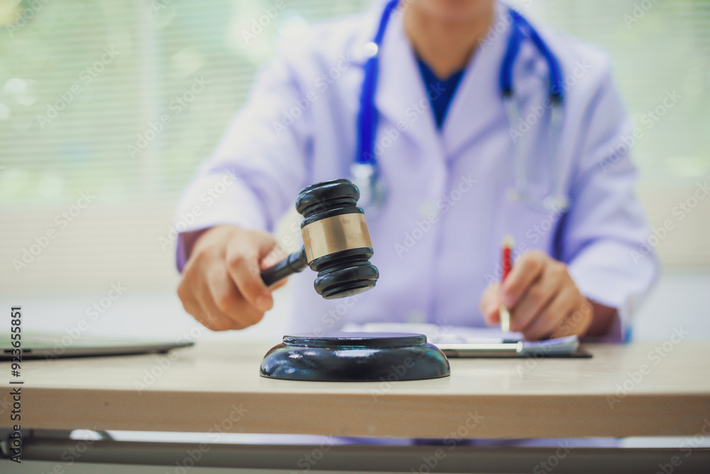 The hammer of justice is a law protecting doctors in diagnosing patients and leading to their death. Hospital insurance considers safety in judgment with lawyers, judges, courts, copy space. The hammer of justice is a law protecting doctors in diagnosing patients and leading to their death. Hospital insurance considers safety in judgment with lawyers, judges, courts, copy space.