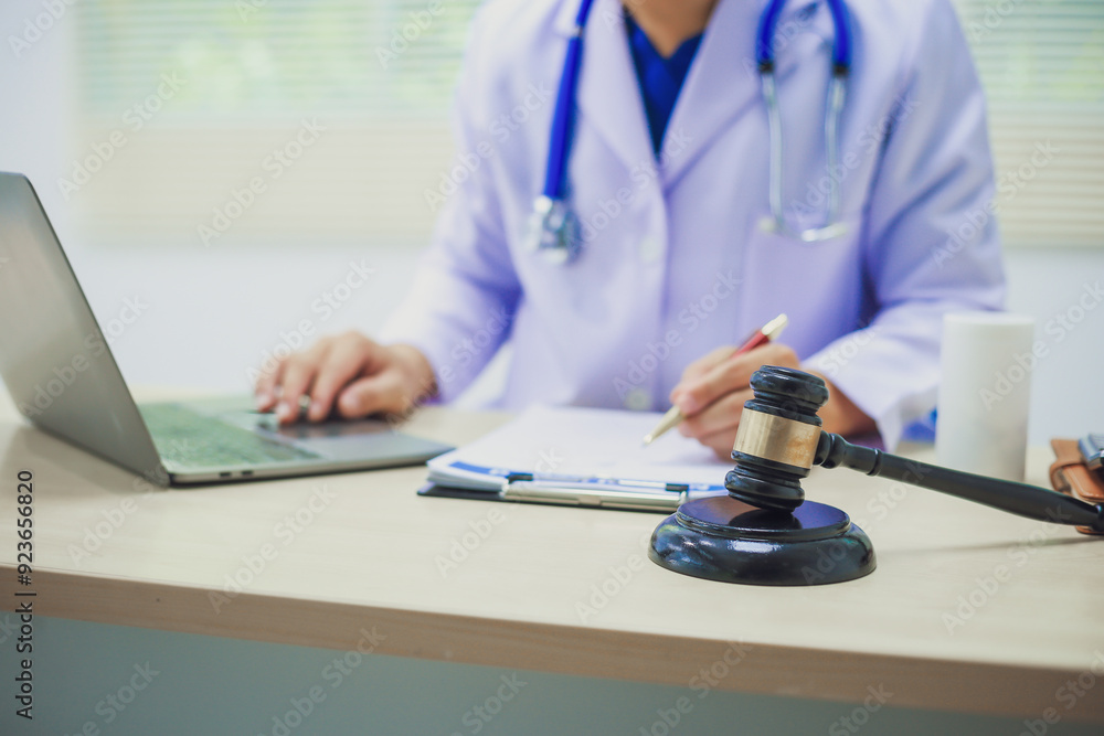 The hammer of justice is a law protecting doctors in diagnosing patients and leading to their death. Hospital insurance considers safety in judgment with lawyers, judges, courts, copy space. The hammer of justice is a law protecting doctors in diagnosing patients and leading to their death. Hospital insurance considers safety in judgment with lawyers, judges, courts, copy space.