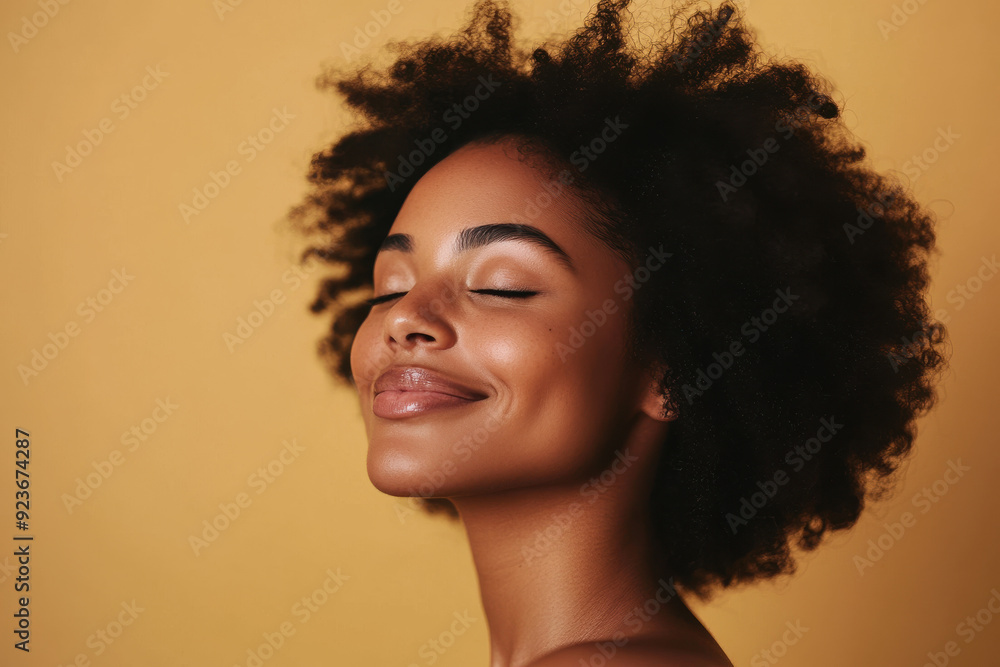 A close up of a black woman's face with her eyes closed A close up of a black woman's face with her eyes closed