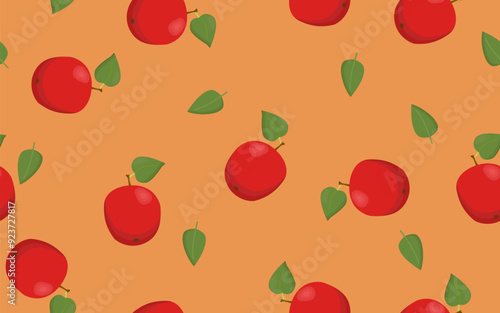 Red apples are isolated on a orange colored background. Seamless pattern. Red apples and green leaves. Background for textile, paper, cover, dishes, interior decor.