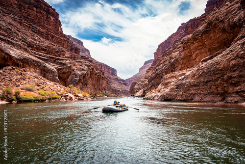Rafting through the Grand Canyon National Park landscape with beautiful walls and mountains. Views of the Colorado River through the canyon valleys. River Trips